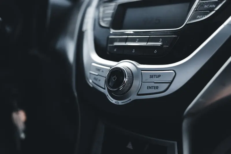 Detailed shot of sleek and elegant car stereo and AC controls